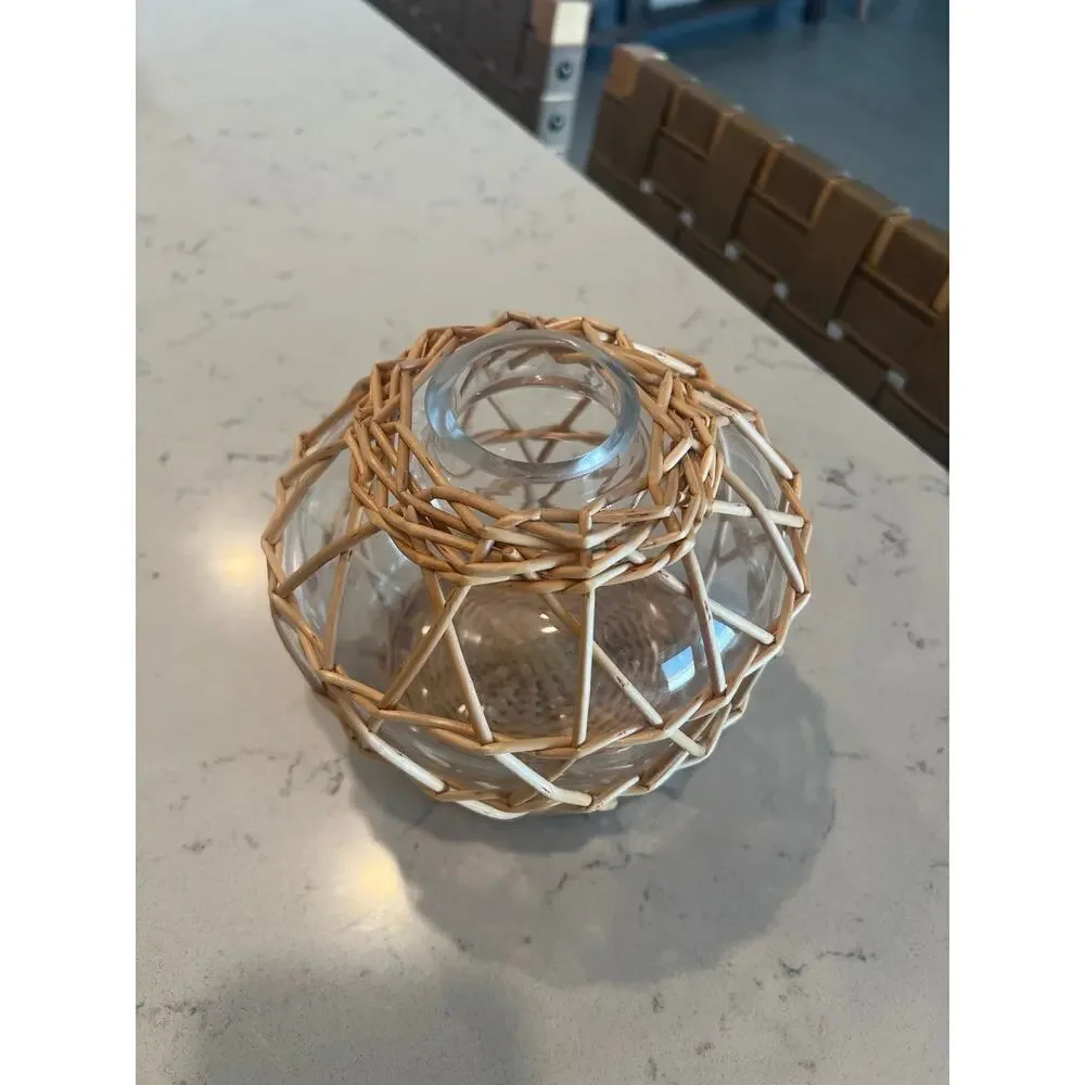 Small glass and wicker vase